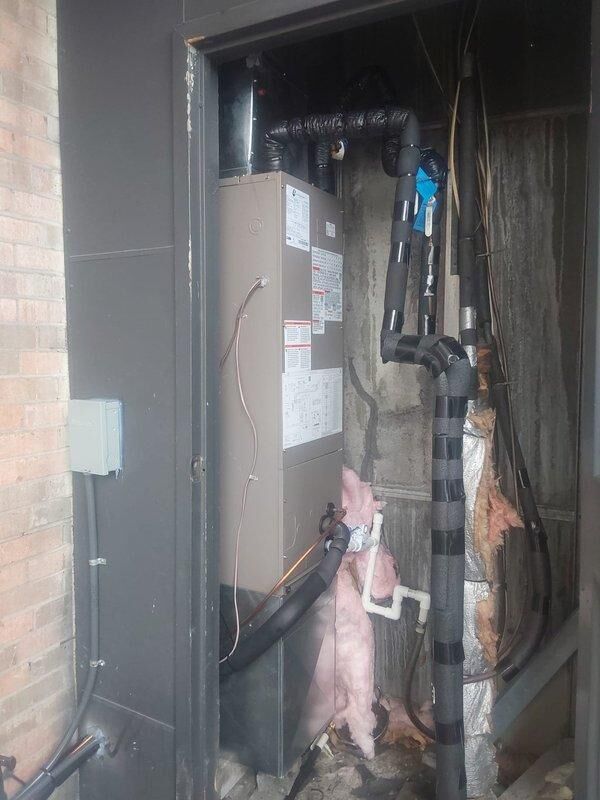 Completed full commercial HVAC system installation including Bryant GA4SAN524 air conditioning condenser unit mounted on exterior concrete pad and BCRMA2124S3N3 water fan coil unit installed in interior mechanical closet. Connected refrigerant lines with proper insulation, installed new thermostat, ran copper piping and PVC lines to existing water supply, secured electrical disconnect and conduit, obtained permit, and verified system operation upon startup.