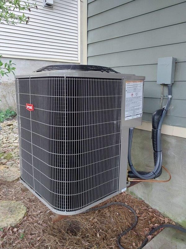 Completed full HVAC system replacement including installation of 926TC66120V24 96% AFUE variable-speed two-stage gas furnace, 135SAN06000W 5-ton single-stage air conditioner with R454B refrigerant rated at 14 SEER2, and CVAVA6024XMA v-coil cased vertical evaporator coil. Performed lineset flush with nitrogen, partial suction line replacement, and installed new disconnect box with fuses. Reconnected unit to existing flue pipes and gas line, retained existing thermostat, filter rack, and condenser pad, and verified all systems operational upon completion.