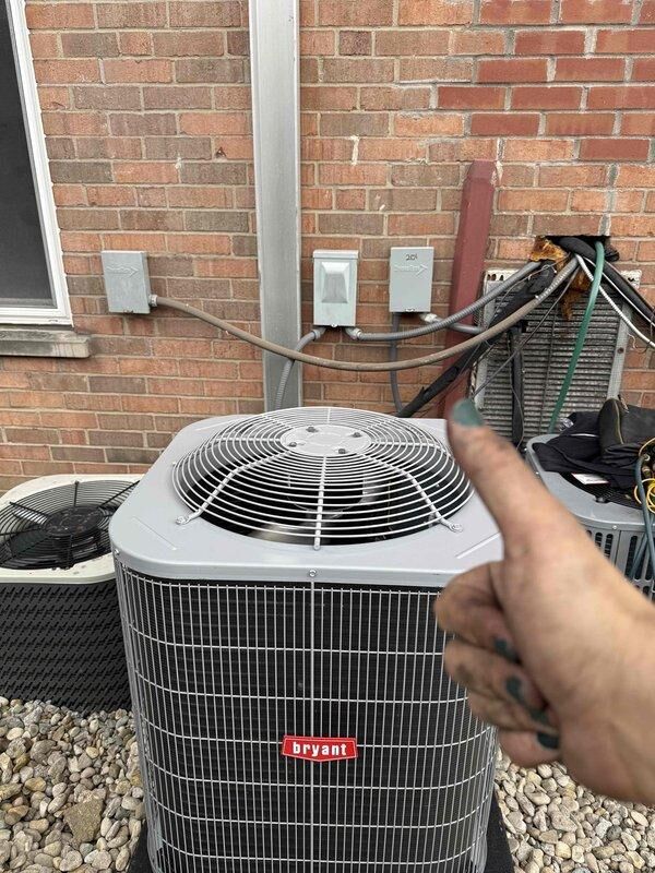 # HVAC Install - Complete System - Comm

Completed full commercial HVAC system installation including Bryant GA4SAN524 air conditioning condenser unit and BCRMA2124S3N3 water fan coil unit. Installed new thermostat for system control and connected equipment to existing supply lines using new pipe and fittings. Mounted outdoor condenser unit on gravel pad against exterior brick wall with proper clearances and secured all refrigerant lines along building structure. Ran electrical connections to wall-mounted junction boxes and conduit. Verified all connections, performed system startup, and confirmed proper operation of both cooling and air handling components. Obtained necessary permit for installation and ensured all work met local code requirements.