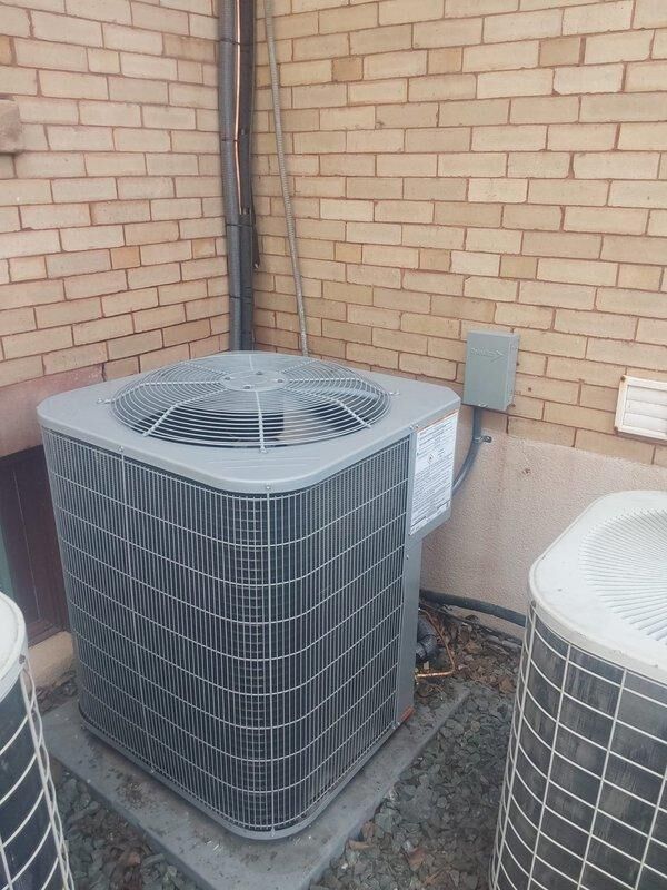 Completed full HVAC system replacement at commercial property including removal and EPA-compliant disposal of existing equipment. Installed new Bryant 3.5-ton split system consisting of GA4SAN542 condensing unit, CVAVA42 evaporator coil, and 912SB42080 80,000 BTU 90% efficiency gas furnace. Relocated furnace from previous location back to attic cubby hole for improved accessibility and space optimization. Ran new refrigerant lineset between outdoor condensing unit and indoor coil, installed new condensate drain pan with proper drainage, and fabricated sheet metal transitions to connect furnace to existing flue system. Mounted condensing unit on new equipment pad with proper gravel base for drainage and stability. Installed electrical disconnect, whip, and fuses for outdoor unit per code requirements. Verified all electrical connections, tested system operation including heating and cooling cycles, and confirmed proper airflow and refrigerant charge. Obtained necessary permit and comple