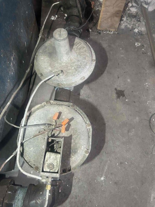 Cincinnati, OH - Responded to no heat call. Inspected gas pressure regulators showing signs of extended service. Found one regulator with an open access panel exposing copper wire terminals. Confirmed proper operation after service and restored heating function.