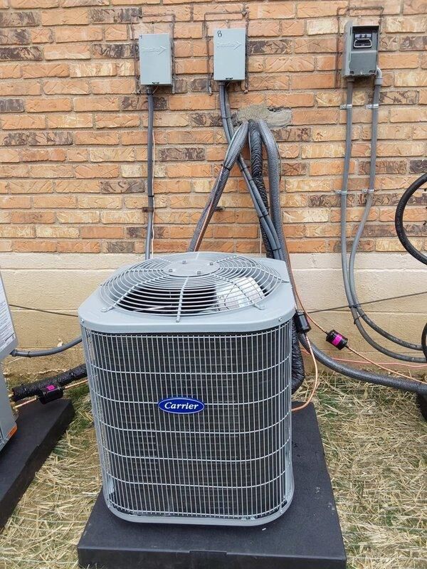 Cincinnati, OH - Installed a complete Bryant HVAC system including FJ5ANXA18L00 unit with 10 Kw heat, GA4SAN518 air handler, disconnect, whip, and fuses. System was properly mounted on pad against brick wall with all electrical connections secured and refrigerant lines installed according to manufacturer specifications.