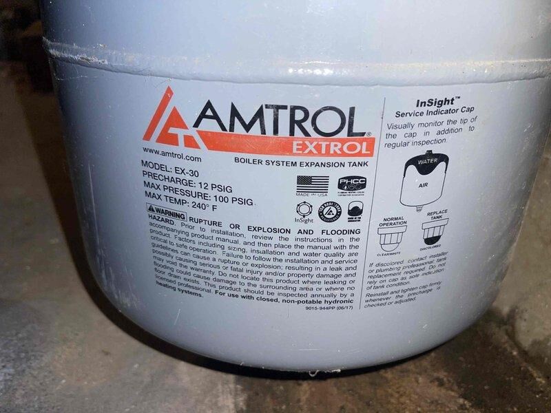 Cincinnati, OH - Diagnosed and repaired pinhole leak on AMTROL EX-30 expansion tank that was causing boiler control issues. System was continuously activating hot water function even without demand, which was resolved after tank replacement.