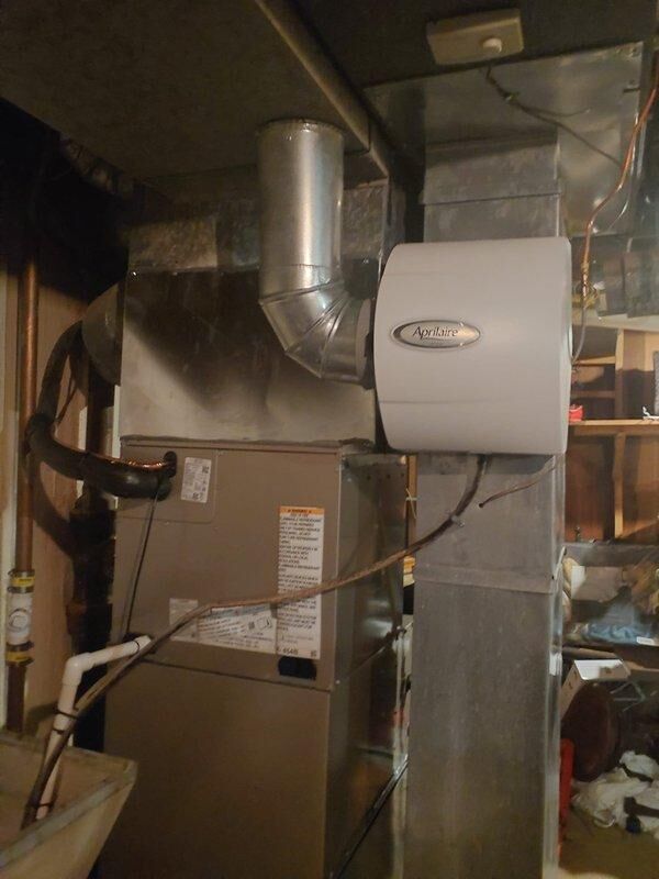 Successfully completed installation of a complete HVAC system featuring a 96% efficient Preferred Variable-Speed, Constant Torque ECM 2-Stage Standard Gas Furnace paired with a 3.5-ton Mid Tier 146SAN Single Stage R454B Air Conditioner (16 SEER2). System installation included evaporator coil replacement, lineset nitrogen purge, new outdoor pad, disconnect box with fuses, new filter rack, thermostat replacement (Honeywell T6 Pro 3H/2C), and reconnection to existing gas line, flue pipes and humidifier.