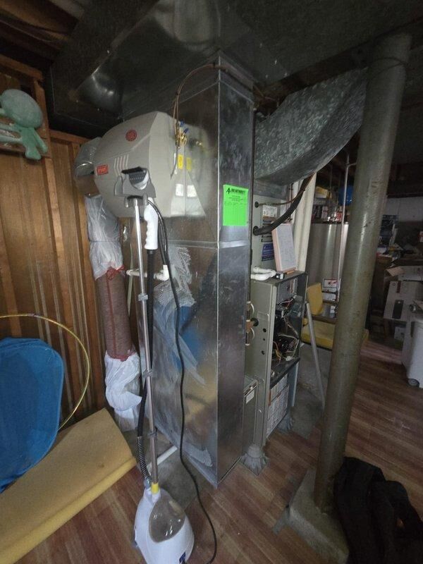 Cincinnati, OH - Conducted comprehensive assessment of existing furnace system located in basement mechanical room. Evaluated current HVAC unit, associated ductwork, and integrated humidification system to determine replacement options and provide detailed estimate for complete furnace replacement.